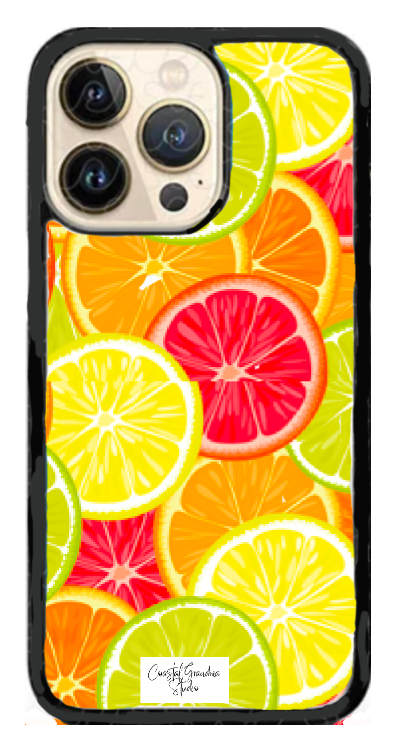 A phone case with slices of lemon, lime and orange made in my studio.