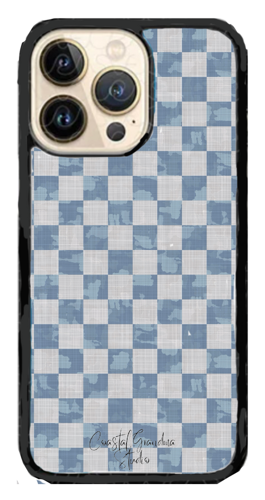 A blue and white checkered phone case for an iPhone with a camera cutout at the top left corner, featuring a design inspired by New England coast bed and breakfasts.